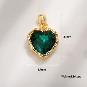 Detail view of heart-shaped emerald zircon pendant with size specs 21x13.7mm