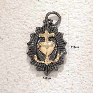 Vintage Herzanhänger in Gunmetal mit Kreuz und Anker Symbolen und Goldakzenten