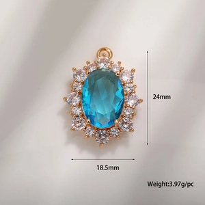Sparkling blue emerald-cut zircon pendant with white stones in gold-plated setting
