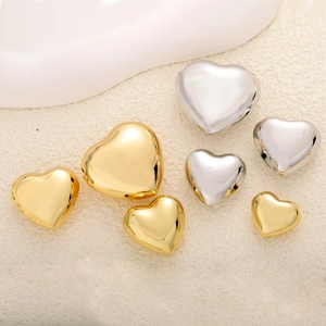 Polished gold and silver heart-shaped beads for DIY jewelry making in three sizes