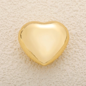 Detailed top view of 3D polished gold heart-shaped charm with smooth mirror finish