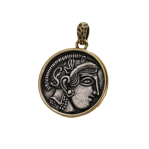Vintage Greek coin pendant with silver relief and textured gold bail on white background