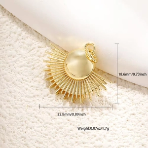 Detailed view of gold plated sunburst charm with size 18.6mm x 22.8mm measurements