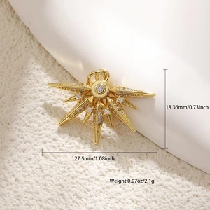 Detailed view of gold plated sunburst pendant with zircon stones and 27.5mm size mark