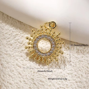 Macro detail of gold plated sun pendant with cubic zirconia inlay and 20mm size specs