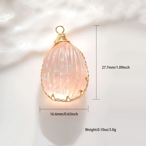 Macro view showing dimensions of pink teardrop flower pendant with gold wire wrap
