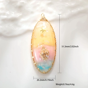 Detail showing dimensions of resin ocean pendant with real shells and starfish