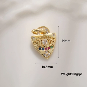 Detail of evil eye pendant with cubic zirconia and dimension labels 14mm by 10.5mm