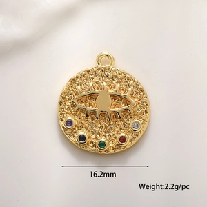 Detailed view of evil eye coin pendant with colorful gemstones measuring 16.2mm