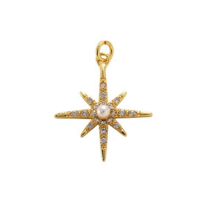 Golden North Star pendant with central pearl and white zircon pavé on white background