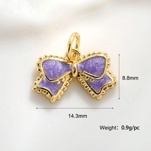 Macro shot of purple enamel bow pendant with dimensions 14.3mm and 0.9g weight