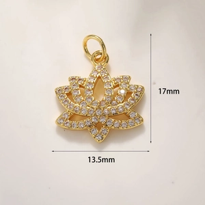 Detailed view of lotus flower charm with cubic zirconia and 17mm x 13.5mm dimensions