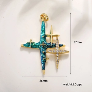 Pendentif étoile doré avec paillettes dégradées sarcelle, zircons et dimensions 37x26mm