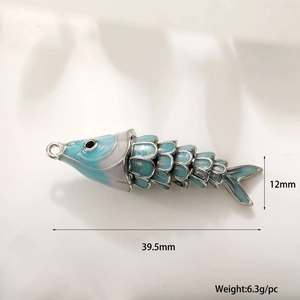 Detail showing a 39.5mm light blue enamel fish pendant with dimensions and weight info