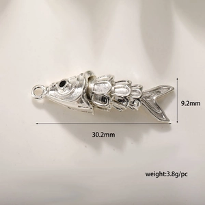 Detailed view of fish pendant dimensions: 30.2mm length with realistic scale textures