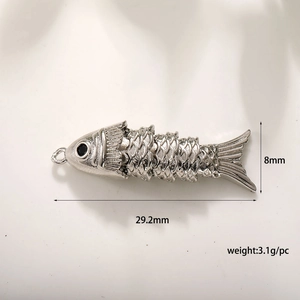Detailed silver fish charm pendant measuring 29.2mm with scale texture and 3.1g weight