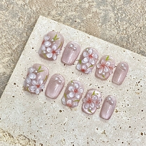 3D embossed cherry blossom press-on nails with cat-eye pink base and pearls