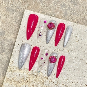 Pink press-on nails with K9 large crystals and silver glitter in long stiletto shape