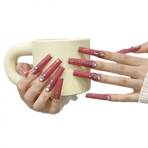 Extra long square press-on nails in dusty rose with silver rhinestones and glitter