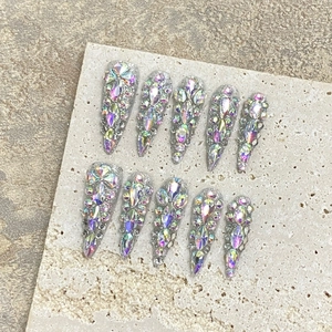 Handmade silver glitter stiletto press-on nails with luxury aurora rhinestone crystals