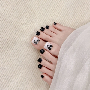 Handmade press-on toenails featuring cute 3D panda design in classic black and white color