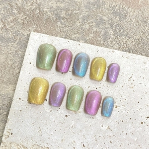 Handmade cat eye press-on nails set with colorful gradient shimmer in 10-piece pack