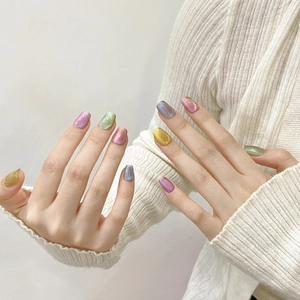 Handmade cat eye press-on nails with colorful magnetic shimmer and polarized finish