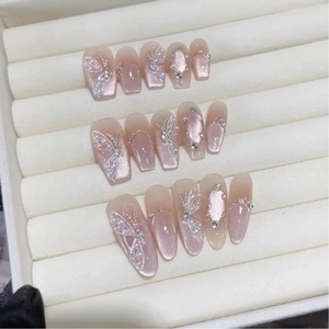 Fairy cat-eye press-on nails set with 3D butterfly, pearls, and crystals decoration
