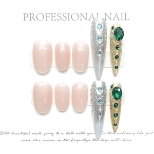 Luxurious handmade press-on nail set with pink, silver and gold jeweled accents