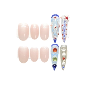 Handmade press-on nail set featuring 3D flower relief, pearls, and pink gradient crystals