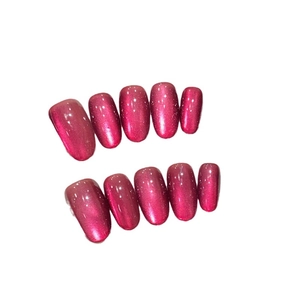 Faux ongles faits main œil de chat rose scintillant avec reflets effet étoilé