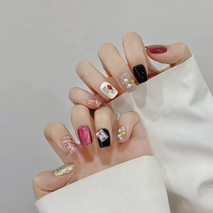 Handmade cat eye press-on nails set featuring glitter, rhinestones and pearl accents