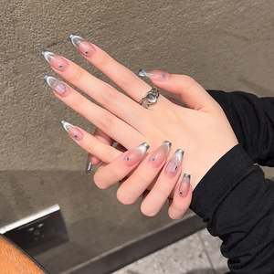 French smile cat eye press-on nails in sea salt mint with 3D rhinestones