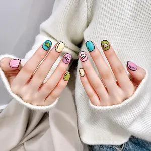 2D cartoon style hand-painted press-on nails with colorful pop art star designs