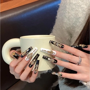 Extra long black and white coffin press-on nails with luxury rhinestones and pearls