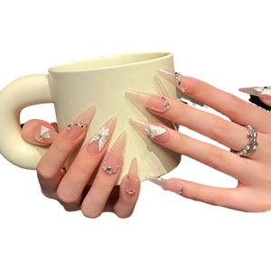 Handmade stiletto press-on nails with 3D white butterflies, pearls and crystals