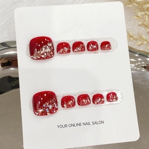 Handmade glossy deep red press-on toenails with gold and silver glitter gradient design