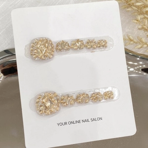 Handmade white press-on toenails with elegant gold rhinestones and pearl accents