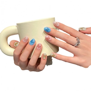 Short round handmade press-on nails with aurora butterfly design in Morandi pastel colors