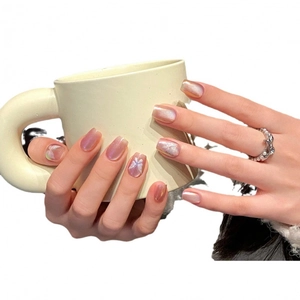 Short pink pearlescent press-on nails with butterfly pattern and aurora finish