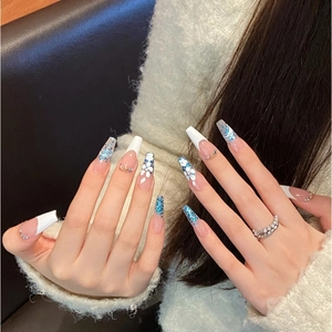 Handmade pink coffin nails with white French tips, blue glitter gradient and 3D floral art