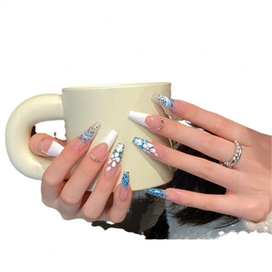 Handmade long coffin press-on nails with blue glitter, 3D white flowers and rhinestones