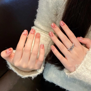 Amber coral red marble press-on nails with white marble veins on short square shape