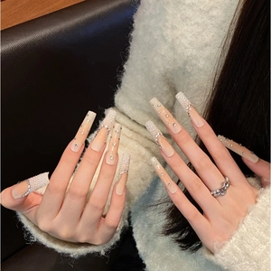 Extra long nude gradient coffin nails with white micro pearls and sparkling rhinestones