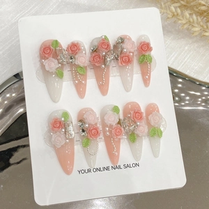 Handmade press-on nails with 3D resin roses, pearls and crystals on pink gradient base
