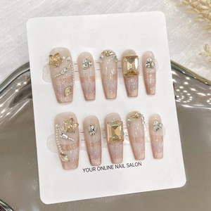 Faux ongles dégradés oeil de chat avec étoiles en strass et forme cercueil longue