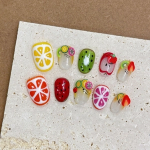 Handmade cute fruit themed press-on nails set featuring vibrant summer fruit designs
