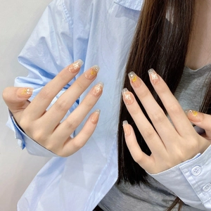 Faux ongles à presser avec motifs papillons et fleurs séchées rose pêche