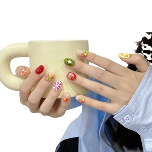 Handmade fruit press-on nails featuring cute lemon and strawberry 3D designs