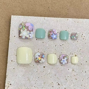 Handmade press-on toenails featuring mint green color and 3D floral sequin designs